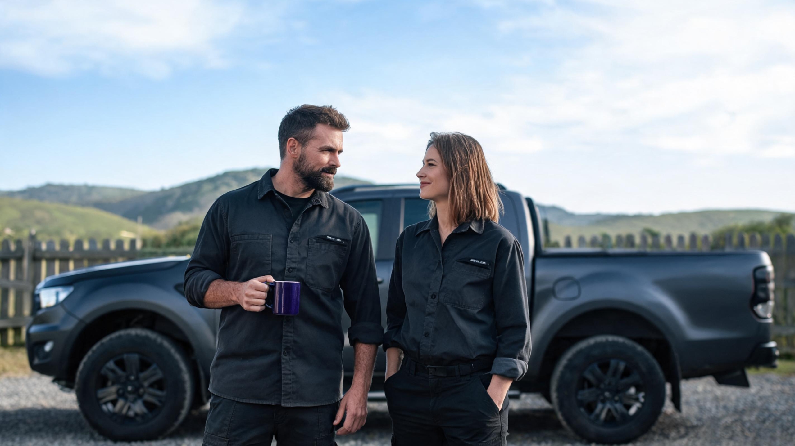 Two tradie founders in matching work gear beside their ute, showing branding for trades NZ in action